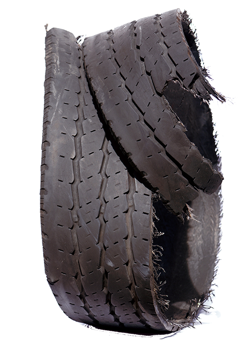 A potential tire case is commonly identified by a tread that has separated from the carcass: 